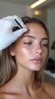 © anatolii - Professional eyebrow shaping session highlighting a young woman's natural beauty in a modern salon environment during daylight hours