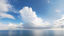 White Cumulus Clouds In Blue Sky Over Sea Landscape Big Cloud Above Ocean Water Panorama Horizon Beautiful Tropical Sunny Summer Day Seascape Panoramic View Cloudy Weather Cloudscape Copy Space