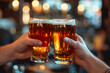 © Andrii  - Two Beer Mugs in a Toasting Gesture