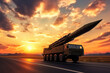 A rocket on wheels, a weapon of mass destruction against the backdrop of a sunset