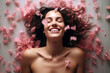 © Magryt - Young European woman having orgasm. Beautiful woman with open mouth and closed eyes enjoying sex lying among rose petals. Sexual experience, getting sexual pleasure, masturbation, cunnilingus.