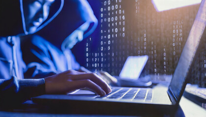 Hacker in mask using laptop in dark room with binary code in background