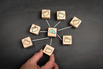 Wall Mural - cloud computing concept. wooden blocks on a dark chalkboard background