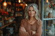 © Migma_Agency - Smiling portrait of a happy Caucasian woman owner of a souvenir shop craft shop