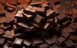 Dark chocolate chunks. Cocoa crumbs Top view. Flat lay. Pattern