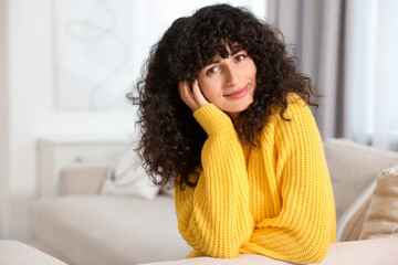 Poster - Young woman in stylish yellow sweater indoors, space for text