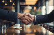 A high-powered business negotiation where the art of persuasion and relationship-building plays a crucial role in reaching mutually beneficial agreements.