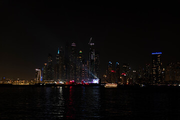 Wall Mural - Beautiful night view of Dubai skyscrapers from the sea. Night panorama of Dubai Marina