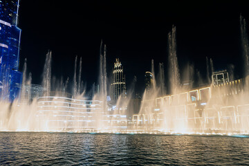 Wall Mural - Dancing fountain show. Magical view night. Tourist attraction. Luxury travel inspiration.