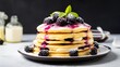 pancakes with blueberry in white plate