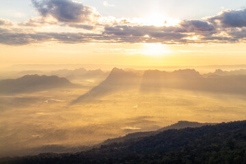 Wall Mural - Beautiful sunrise at Phu Kradueng National Park, Thailand.