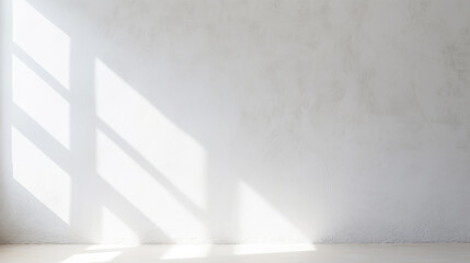Minimalistic abstract light grey wall background for product presentation with sunlight shadow