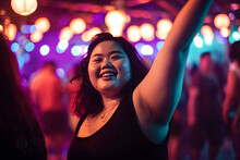 Portrait Of Confident Overweight Happy Dancing Asian Woman In Crowded Nightclub Embodying Body Positivity, Selective Focus Shot With Neon Lights