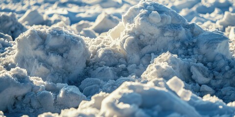 Canvas Print - A pile of snow sitting on top of a snow-covered ground. Suitable for winter-themed designs and illustrations