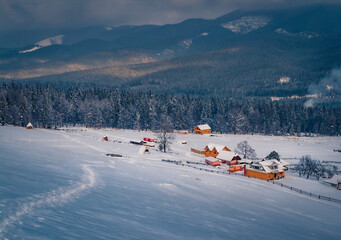 Sticker - Beautiful winter scenery. Snowy morning scene of Carpathians village. Dramatic winter view of Kryvopillya village, Ukraine, Europe. Beauty of countryside concept background.