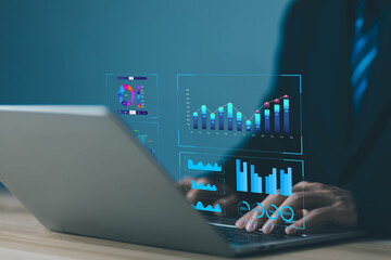 Wall Mural - analyst manages the system database, analysis data plans, and reports. shows a dashboard chart on the computer. concept of analytics business, research on platform digital technology 