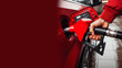 A guy fills his red car with fuel, banner for advertising, poster, design, cover, space for text
