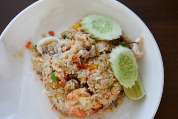 Wall Mural - Directly above of fried rice with shrimp and squid on plate
