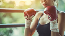 Adult Asian Women Using Elastic Bandage To Tie On Her Hands Before Put On A Boxing Glove For Boxer Training Class, Sport, Fitness And Exercise Concept For Good Health And Strong Muscle And Body.