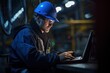 © ORG - Engineer in oil refinery using laptop computer for maintenance work