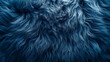 Top view of blue fur texture, resembling a sheepskin background. Shaggy fur pattern in shades of blue, providing a close-up view of wool texture.