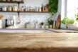 Blurry White Kitchen Featuring A Wooden Countertop