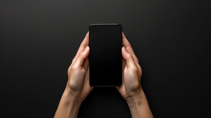 Poster - A top-down perspective capturing hands with a mobile mockup against a black background, the high-definition image highlighting the realistic texture and sleekness of the device