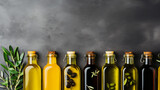 Fototapeta  - Olive oil in a bottle on a texture background