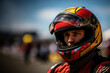 Close up photo of a racer wearing a helmet as protection