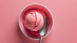 One rounded scoop strawberry ice cream, top view on pink background, photorealistic no cone