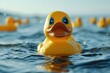 A yellow rubber duck floating in the water. Can be used for bath-related themes or children's toys
