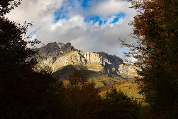 Landscape of Picos de Europa National Park in Asturias Cantambrian mountains with peaks and autumn forest