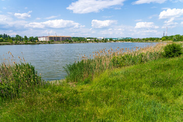 Wall Mural - Lake or pond. Background with selective focus and copy space