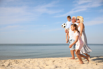 Sticker - Cute little children with grandparents spending time together on sea beach