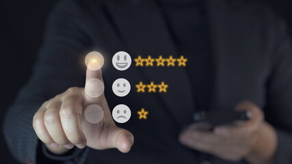 Wall Mural - Businessman touching smile face icons and info graphic to evaluate product after use service , customer satisfaction concept.