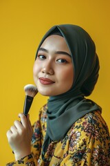 Wall Mural - malay woman age 20 years old with hijab hold make up