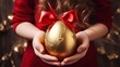 large golden easter egg with ribbon bow