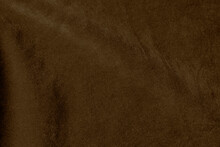 Brown Color Velvet Fabric Texture Used As Background. Empty Brown Fabric Background Of Soft And Smooth Textile Material. There Is Space For Text.