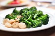 macro shot of orecchiette, broccoli rabe details on plate