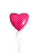 Pink heart shaped balloon with white dots and ribbon isolated on white background. Birthday party gift. Floating object. Inflatable ball by helium gas. Valentines day. Love symbol. Birthday party