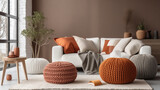 Fototapeta  - Scandinavian, hygge style home interior design of modern living room, Knitted pouf near white fabric sofa with blanket and terra cotta pillows, Ai generated image