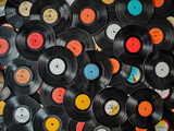 Fototapeta  - Top view of a pile of many vintage vinyl records background. High quality