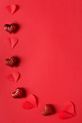 Sticker - Valentines day card mockup with red hearts on red paper background, top view, copy space.	