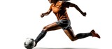 Fototapeta Sport - Young female soccer or football player with long hair in sportwear and boots kicking ball for the goal in jump on white background.