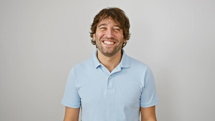 Sticker - Happy young caucasian man sticking tongue out with hilarious joy, standing isolated on white background, showing a funny face expression