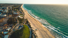 Aerial View Of A Skate Bowl In The White Sand Beach Of Scarborough In Perth During A Golden Sunset - Western Australia