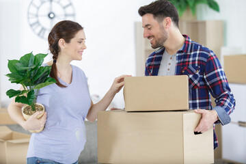 young happy couple move to a new home