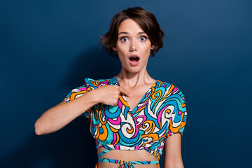 Poster - Photo of young confused offended woman dressed stylish summer vintage crop top pointing finger herself isolated on blue color background