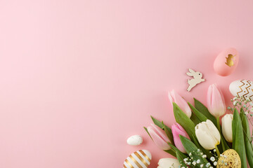 Wall Mural - Easter festivity arrangements. Top view photo of colorful eggs, fresh tulips, easter bunnies on light pink background with promo space