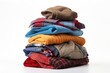 © Alina - Stack of colorful clothes on white background